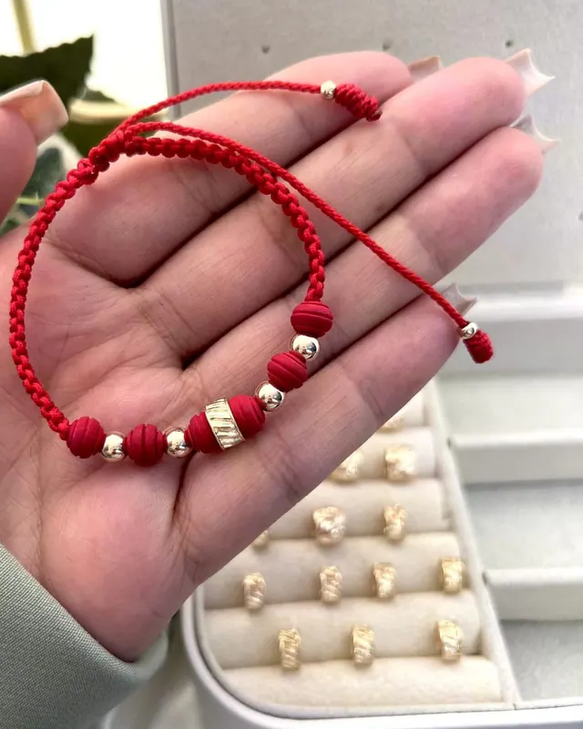 Pulsera Cuentas Rojas Tubo Dorado
